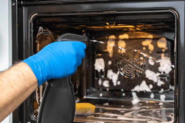 Oven being sprayed in colchester